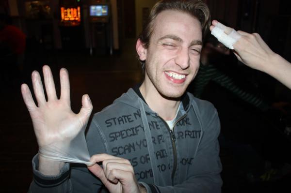 Matt prepares to give Lil a cavity search.