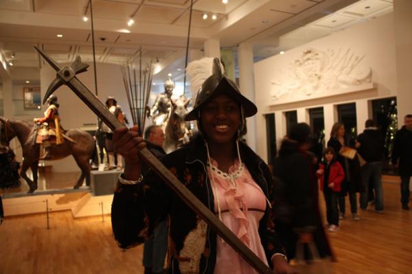 Faye wielding a poleaxe.