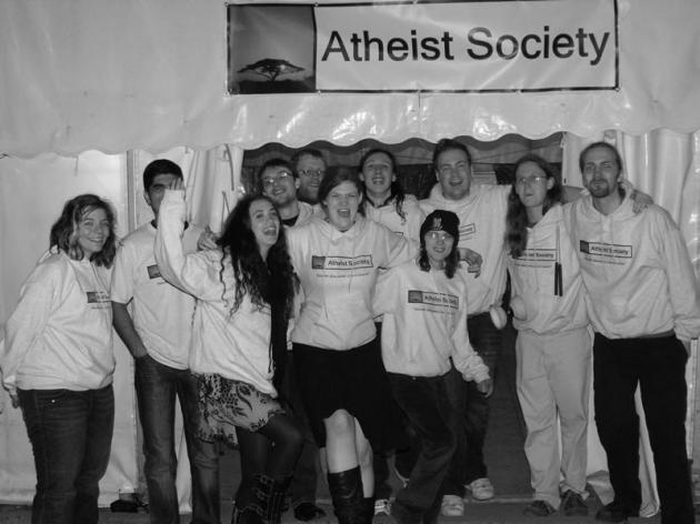 The team posing outside the tent.