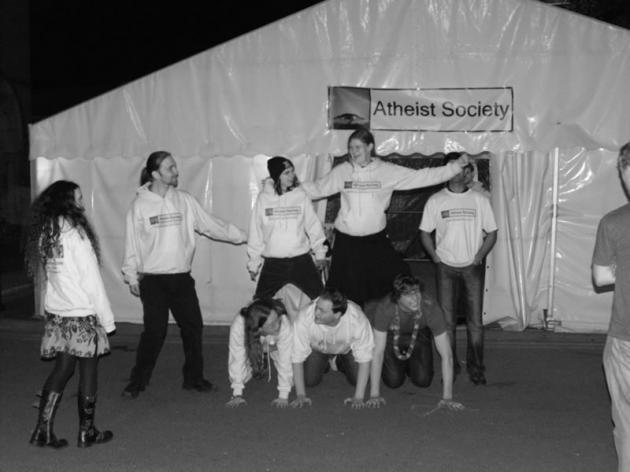 The team posing outside the tent.
