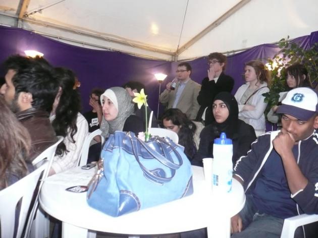 The debates fill the tent.