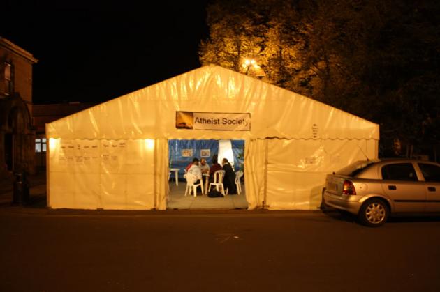 Outside the tent on a night.