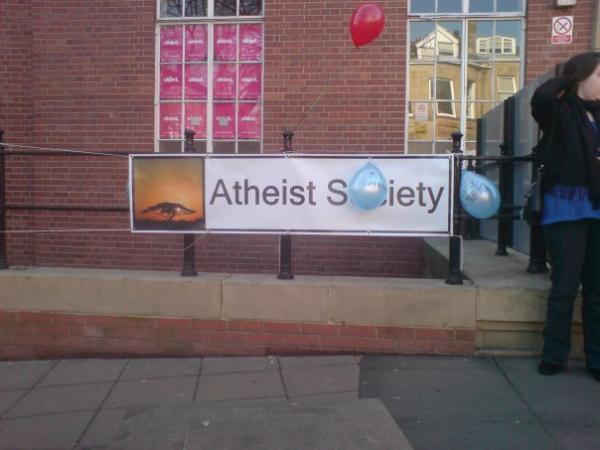 Our banner on the railings outside the union.