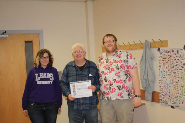 Sophie and Norm present Paul with his certificate for honourary life membership.
