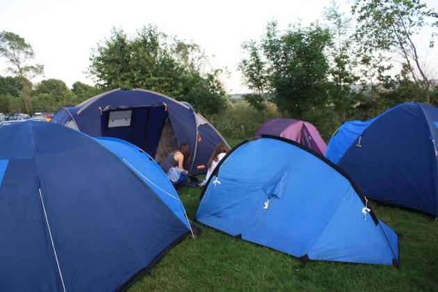 The tents.