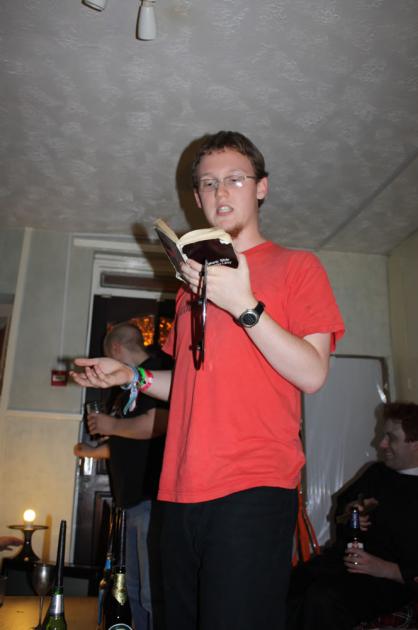 John performing the Satanic ritual.