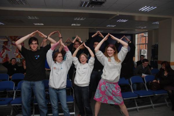 Attendees at the AHS national conference make an A for Atheist.