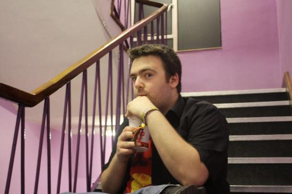 Gaz tucks in to McDonald's back at the hostel.