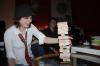 Liz playing Extreme Jenga.